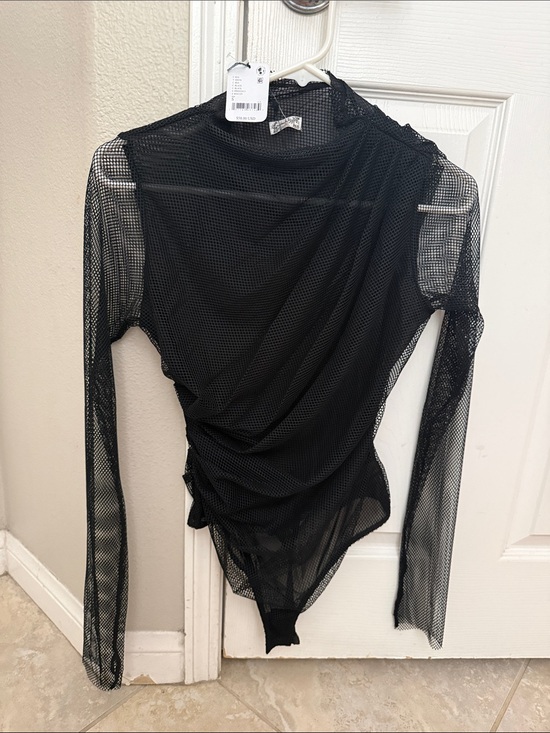 Free People Tops - NWT Intimately Free People
Black Mesh Long-Sleeve Bodysuit